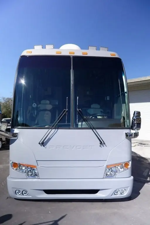 Prevost H3-45 Entertainer after collision repair and a new 2016-style front facelift by Excalibur Coach
