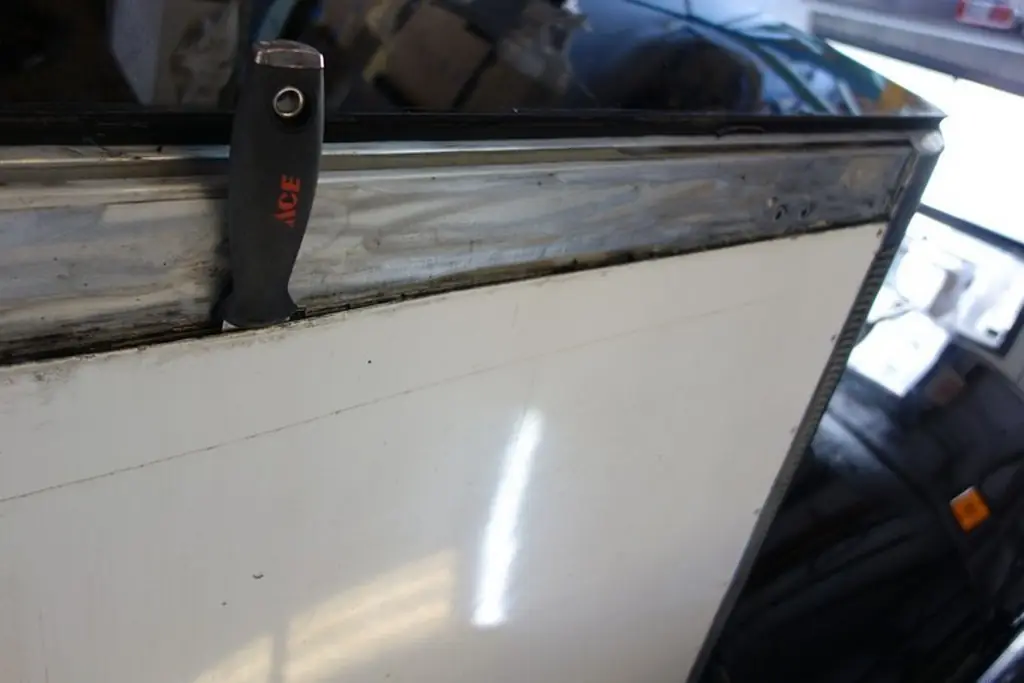 Prevost XL II salon slide-out with loose panels repaired by Excalibur Coach